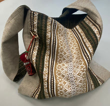 Load image into Gallery viewer, Canvas cross body beige tote with hanging motanka amulet from Bakhmut Creative Workshop