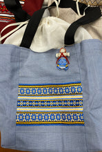 Load image into Gallery viewer, Canvas tote with hanging motanka amulet from Bakhmut Creative Workshop