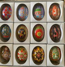 Load image into Gallery viewer, Pysanky hen eggs with symbolic graphic patterns
