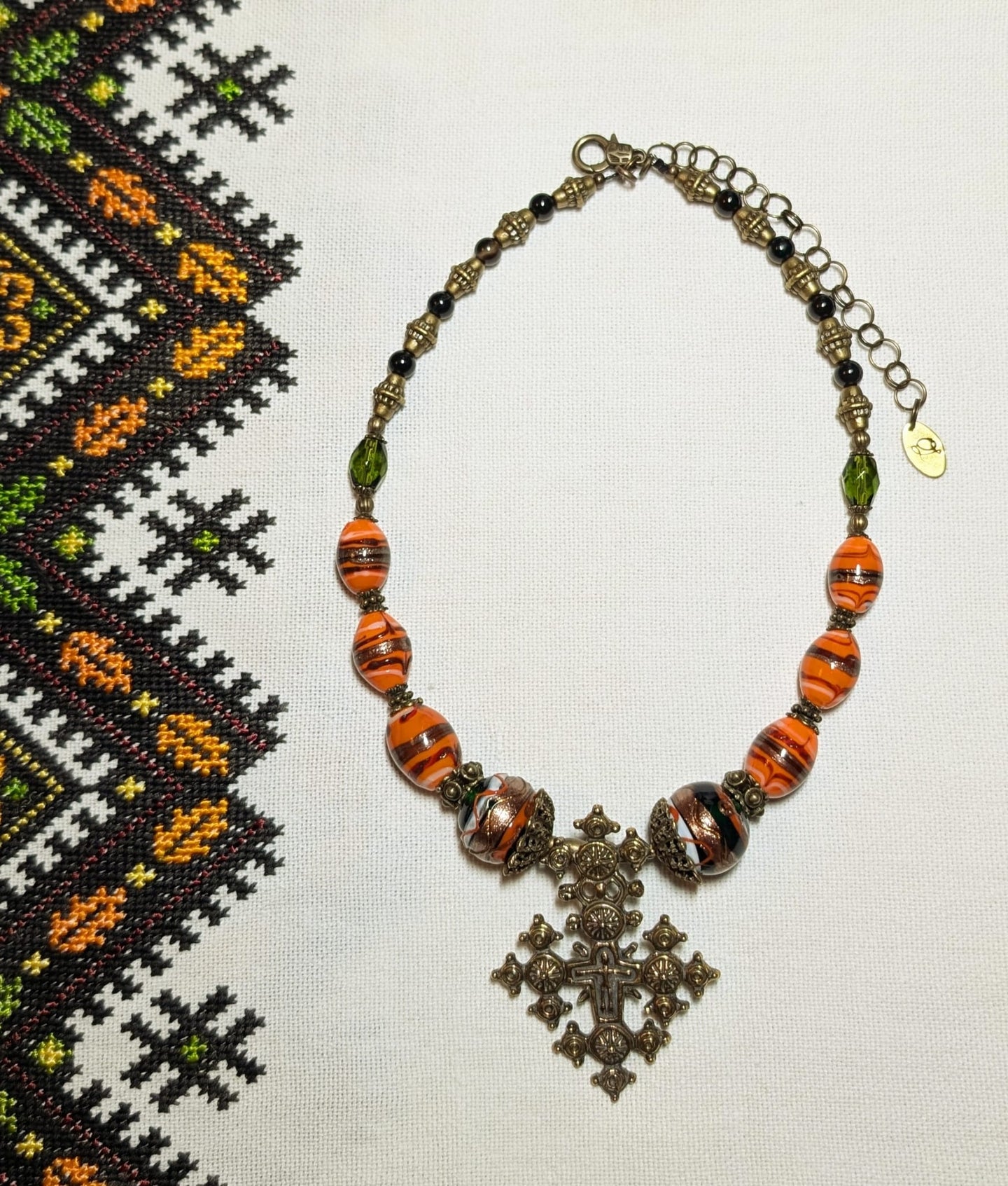 Olena Labunka single strand necklace of glass beads, traditional Hutsul cross   #2