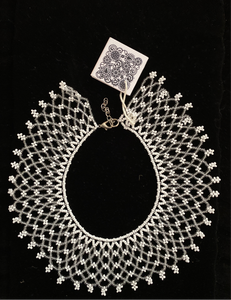 Bakhmut 2 " wide Gerdan collar of clear beads pearlized white beads with dainty flower design .