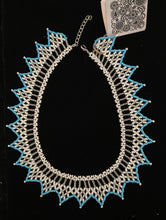 Load image into Gallery viewer, Bakhmut 1 1/2&quot; wide Gerdan collar of clear and white beads with blue or pink edging.
