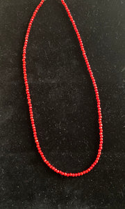 Nina Lapchyk 16 1/2" delicate faceted round coral beads #9