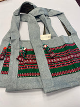 Load image into Gallery viewer, Canvas cross body holiday green tote with hanging motanka amulet from Bakhmut Creative Workshop
