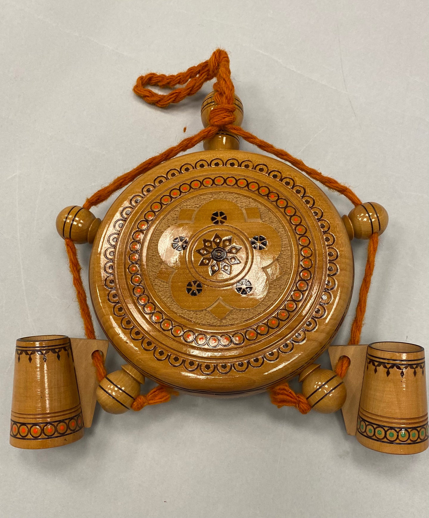 Wooden carved and painted round canteen with 2 cups