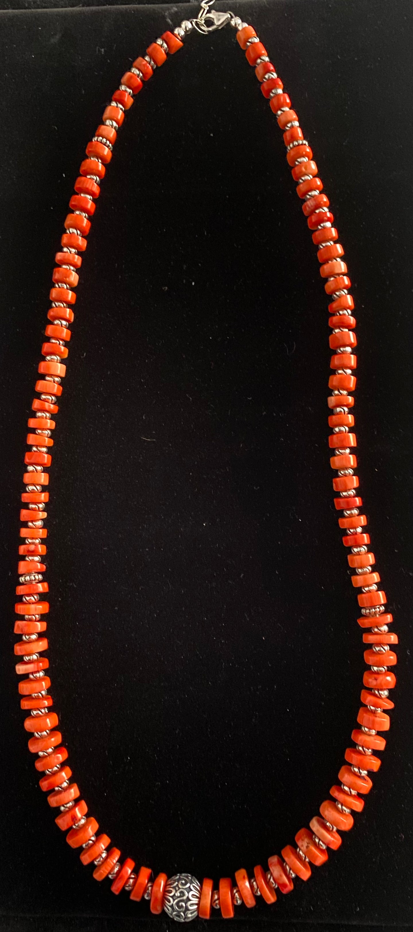 Nina Lapchyk 30” long cut orange coral beads with silver spacers and center filigree ball  medallion #125