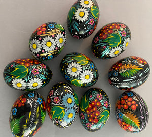 Wooden Pysanky with painted kalyny or cornflowers.