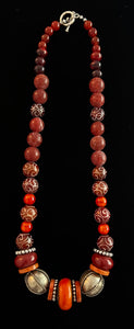 Yara Litosch  22" single strand necklace with Morocccan orange resin #43